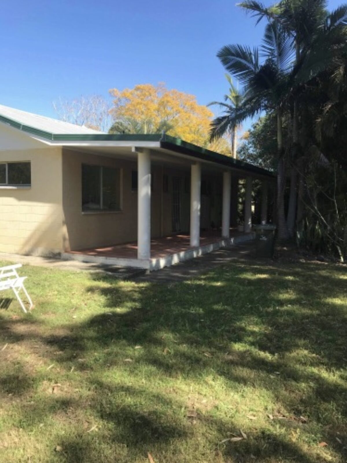 Painted brick home — front elevation — before render