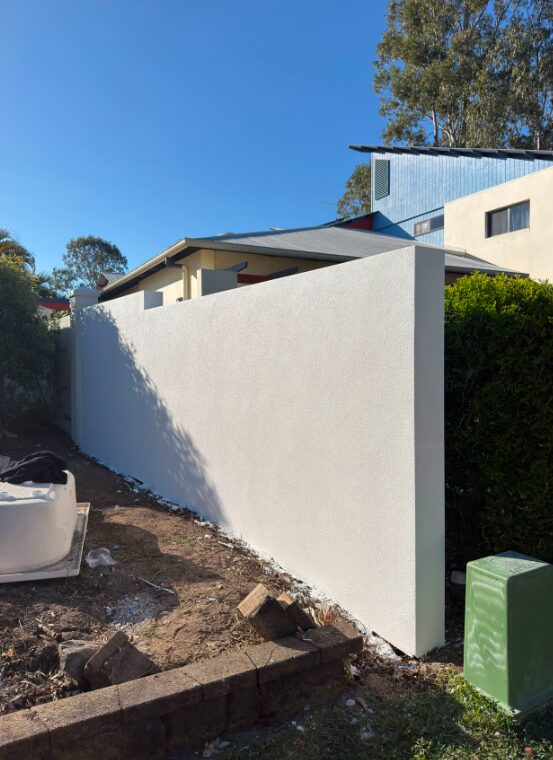 Rendered boundary wall